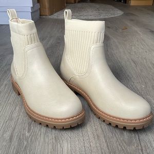 Cream boots with sock ankle detail. Luxurious high end boutique Corkys brand TTS